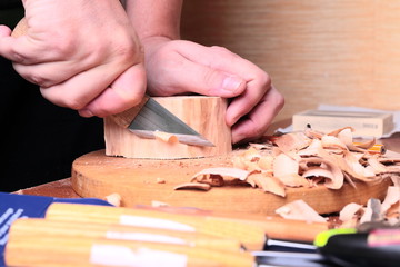 carpenter hand carving wood