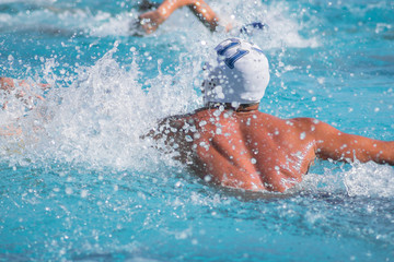 water polo player shooting