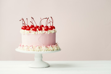 Cake decorated with maraschino cherries - obrazy, fototapety, plakaty