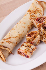 Sweet Rolled Pancakes on Plate