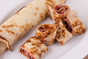 Sweet Rolled Pancakes on Plate