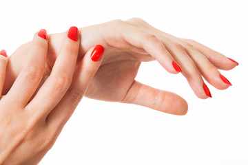 Woman with beautiful manicured red fingernails