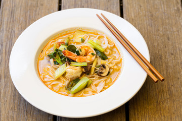 Bowl of traditional Thai tom yam soup