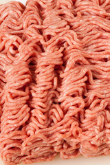 Block of commercial beef mince from a store