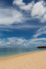 Beautiful tropical beach with lush vegetation