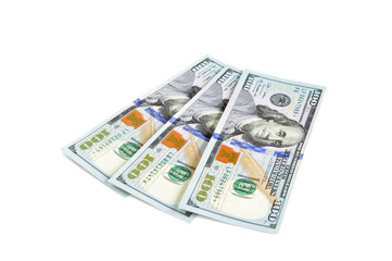 100 United States dollar bills on white background