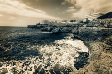 rocky ocean shore, black and white photo