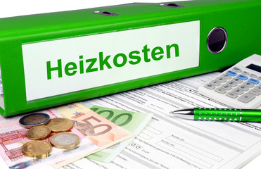 Heizkosten Ordner mit Geld und Taschenrechner, grün