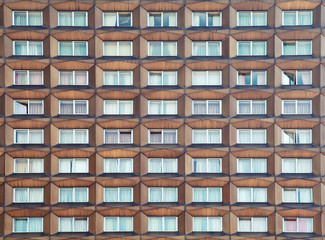 Metal facade with windows, background texture