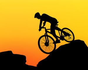 Obraz premium cyclist silhouette extreme biking