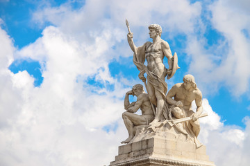 Fototapeta na wymiar Statues in a monument to Victor Emmanuel II. Piazza Venezia, Rom