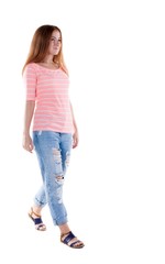 Obraz premium back view of walking woman .