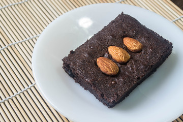 Cakes, brownies, sprinkle almonds.