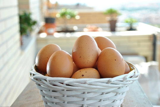 eggs in a white wicker basket