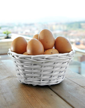 eggs in a white wicker basket