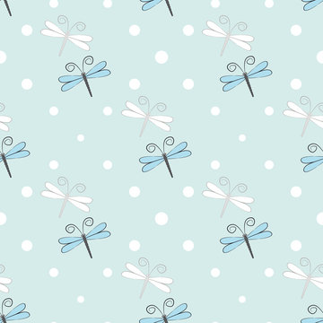Seamless pattern with dragonflies on light blue background