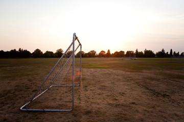 soccer field with sunset