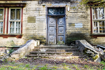 old wooden door and staircase in a Jurmala house