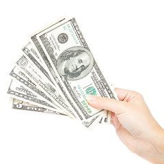 Beautiful female hand holding a stack of banknotes.