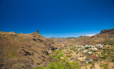 Roque Bentayga seen over Tejeda village
