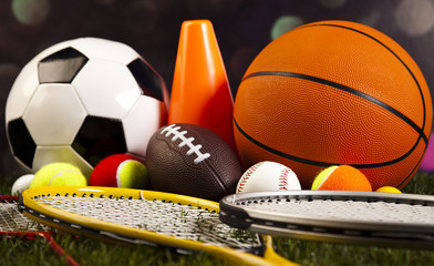 Assorted sports equipment and grass