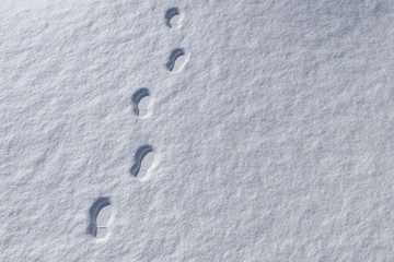 Footprints in snowy landscape