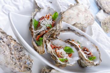 oysters with parmesan and baked tomatoes