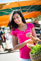 healthy woman shopping farmer's market organic fruits vegetables