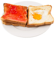 Bread toast with fried egg and strawberry jam