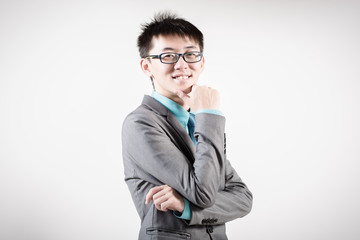 Successful young business man of Asian, full length portrait iso