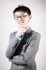 Successful young business man of Asian, full length portrait iso