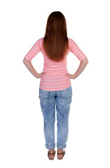 Obraz premium back view of standing young beautiful redhead woman.