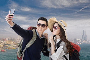 Asian couple travel and selfie