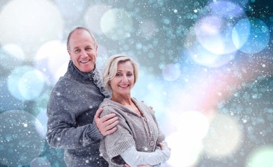 Composite image of mature winter couple
