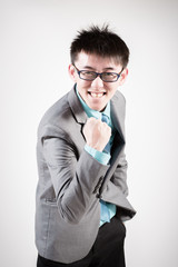 Successful young business man of Asian, full length portrait iso