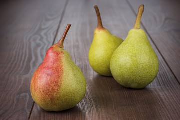 fresh pears on the wooden table