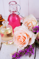 Fototapeta na wymiar Essential aroma oil with roses