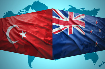 Waving New Zealand and Turkish flags