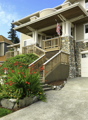 House with stone trim and deck