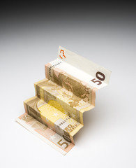 euros in the shape of scale