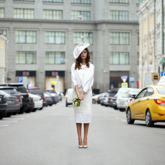 Young beautiful model in a stylish designer clothes