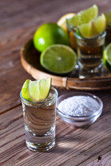 gold tequila with salt and lime