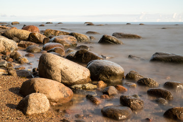 View of a rocky coast in the morning. Long exposure shot.