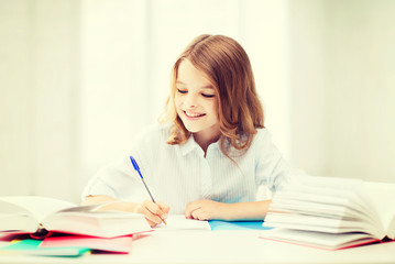 student girl studying at school