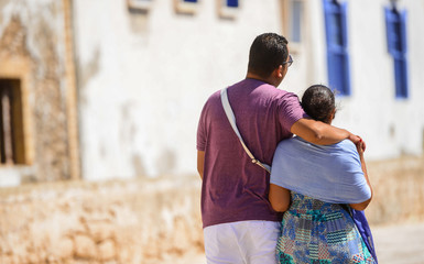 Closeup to a young couple sightseeing in the town