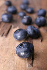 Blueberries on wooden background closeup