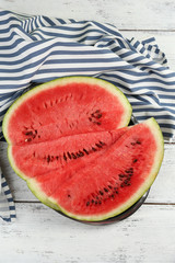 Fresh slice of watermelon on table outdoors, close up
