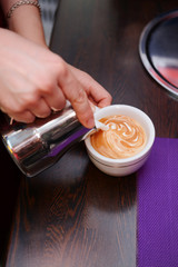 Woman preparing coffee, close up