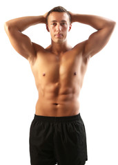 Fototapeta premium Handsome muscle young man isolated on white