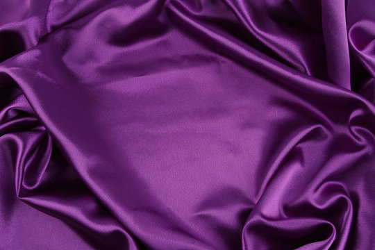 Fototapeta Rippled purple silk fabric texture background